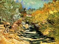 Un camino en St Remy con figuras femeninas Vincent van Gogh